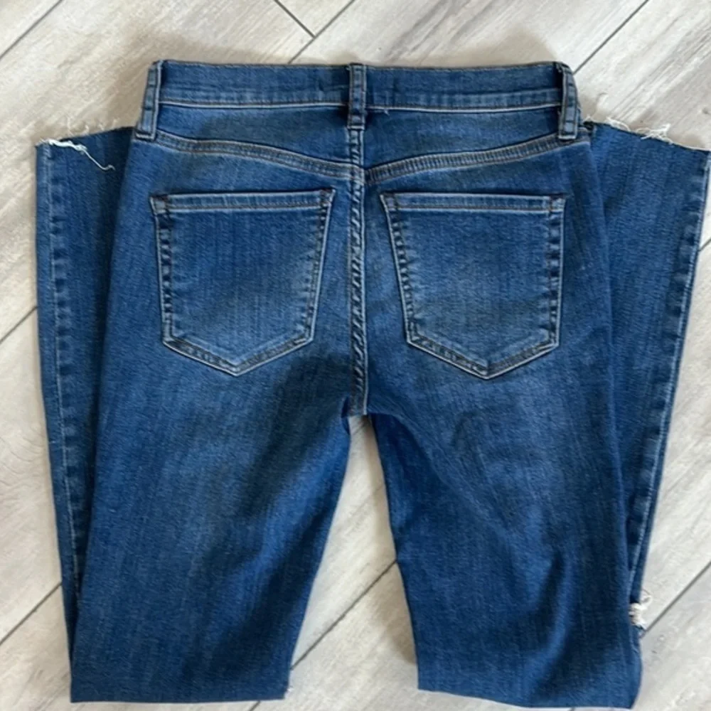 Free People size 25 busted knee button fly jeans